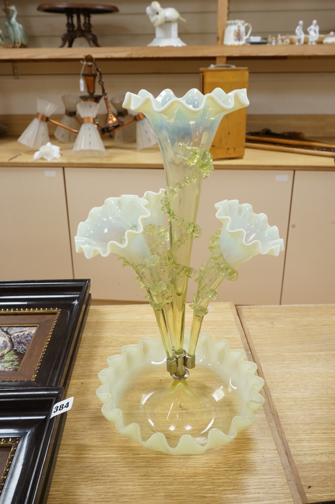 A 19th century Vaseline glass epergne, 44cm high